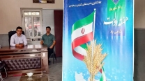 نصب بنر هفته دولت در محل کارگزاری شهرستان بجنورد